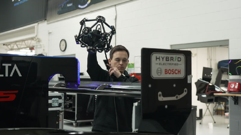 WTRAndretti engineer scanning a special part with the Creaform MetraSCAN