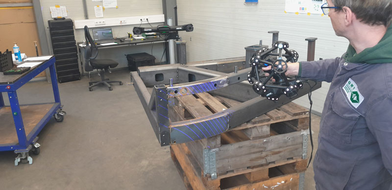 GMT Wintersteller’s employee using the MetraSCAN 3D to measure a steel part in the production area.