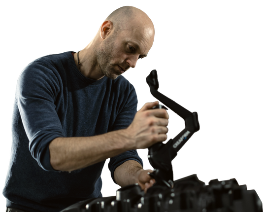 Man probing plastic engine valve with HandyPROBE