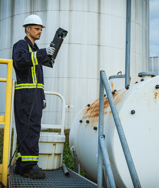 man-scanning-pressure-vessel