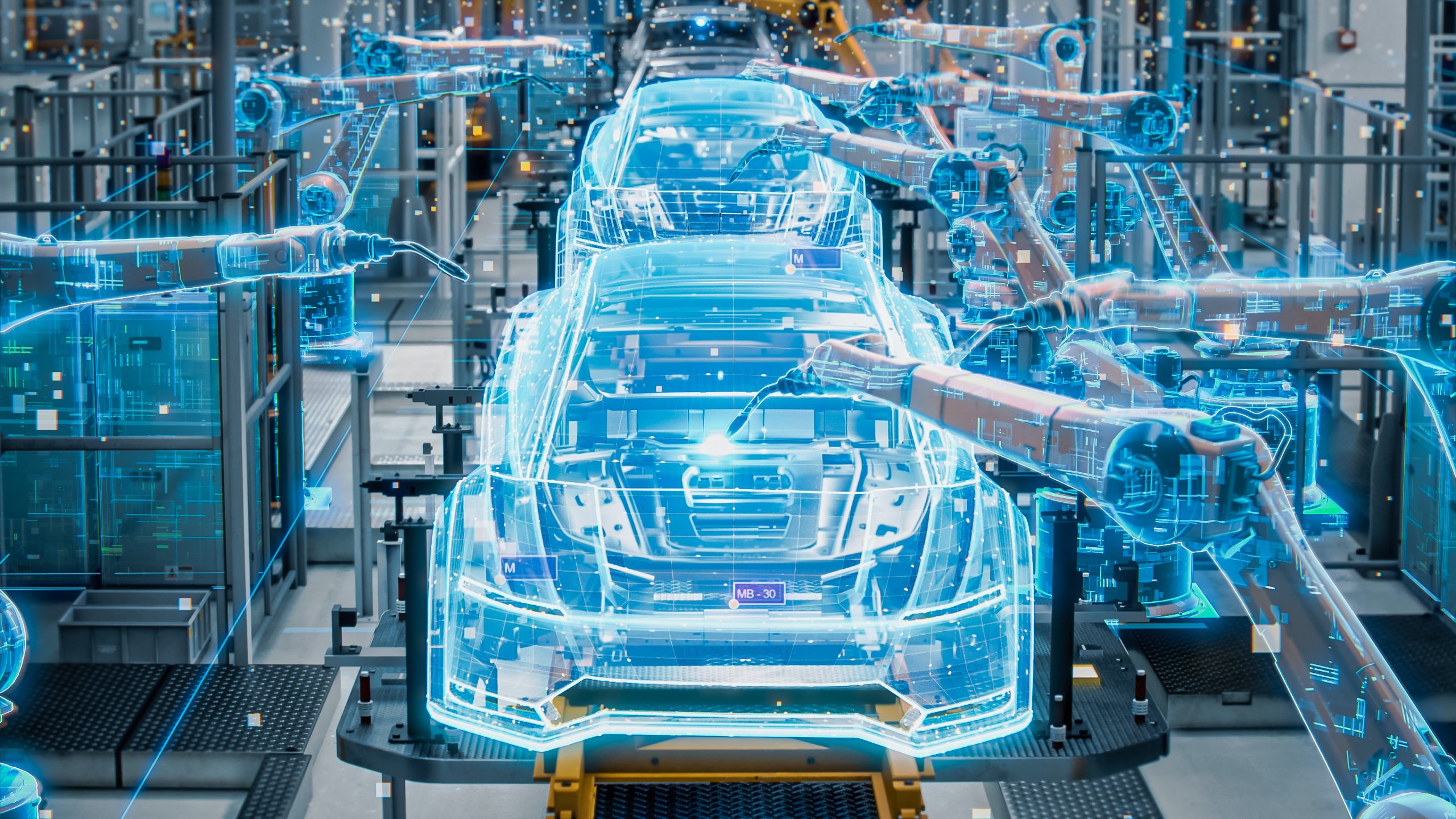 Linha de montagem de automóveis onde os braços robóticos automatizados são usados para a fabricação de veículos elétricos.